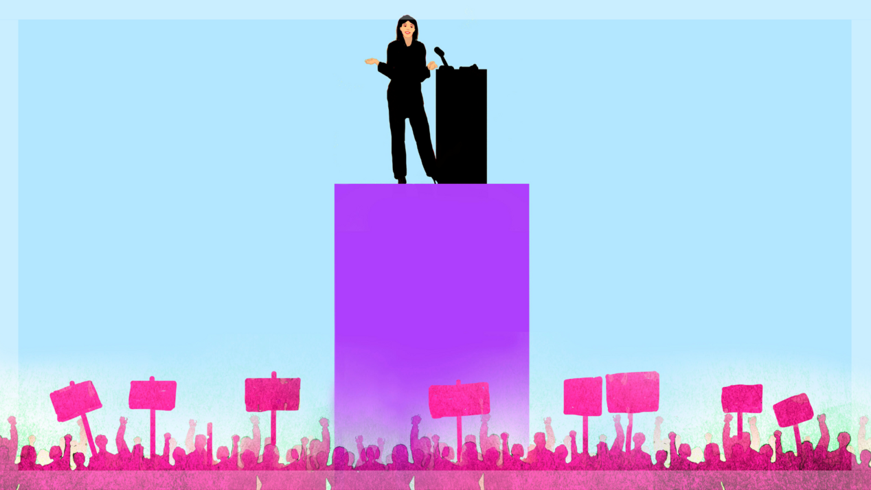 Illustration shows a woman with a lectern addressing demonstrators against a blue background.